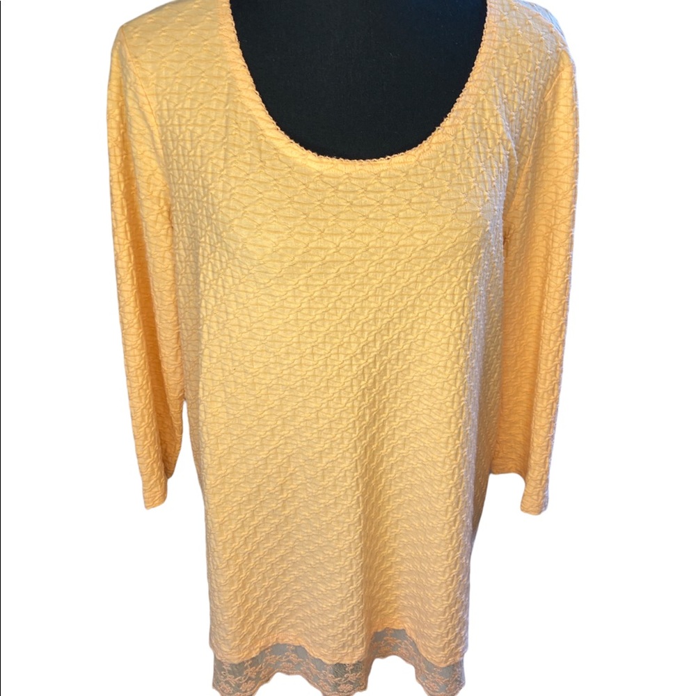 Bright pastel orange top